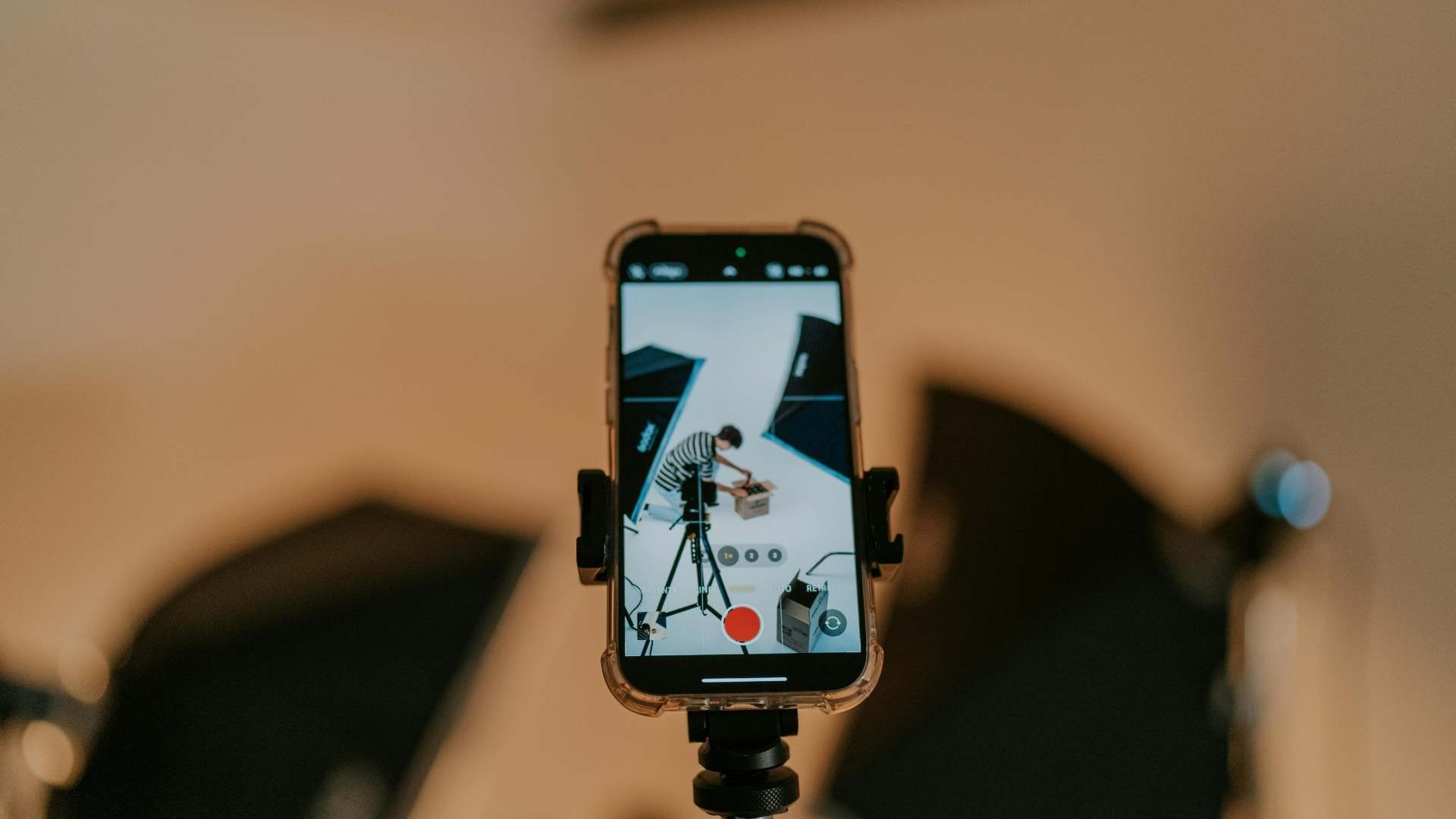 Smartphone recording a short-form video in a studio setup for social media content creation
