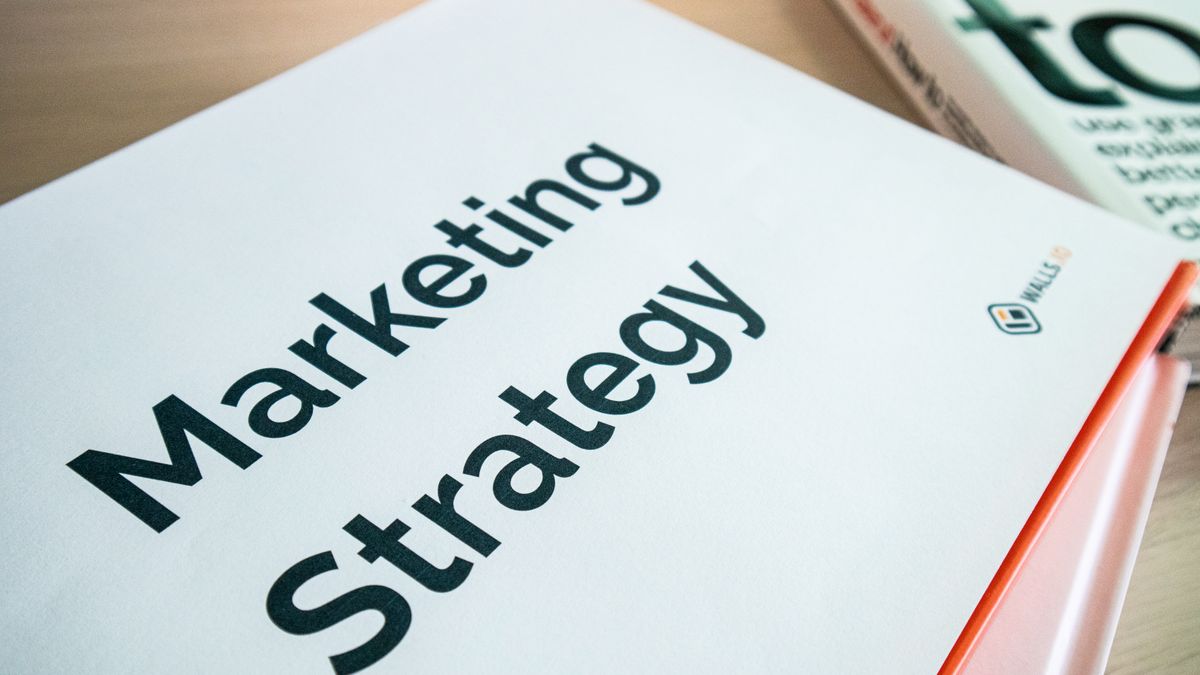 Close-up of a marketing strategy document on a desk, ideal for business content.