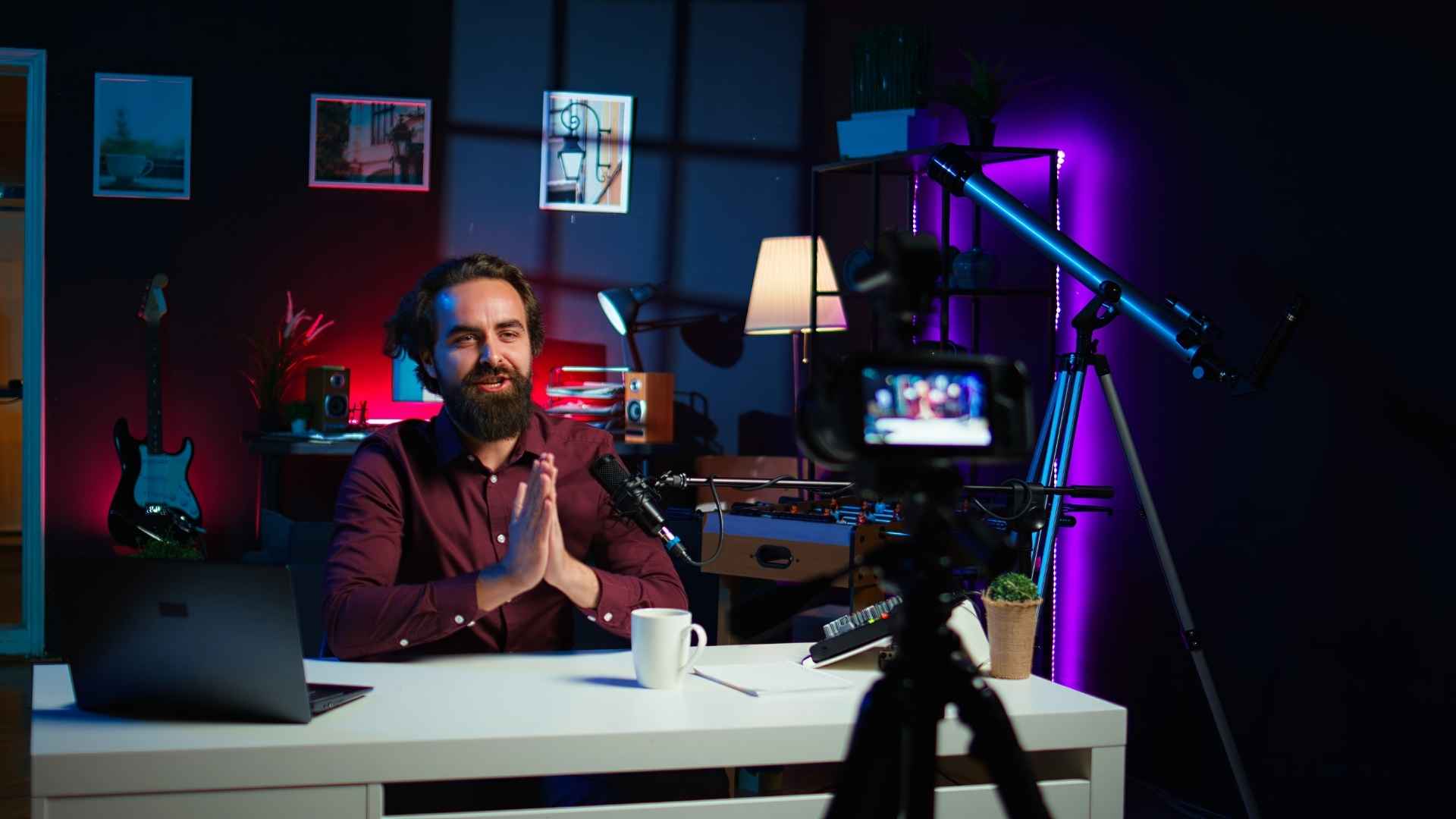 Instagram creator filming in a professional home studio with camera, microphone, lighting, and content production equipment
