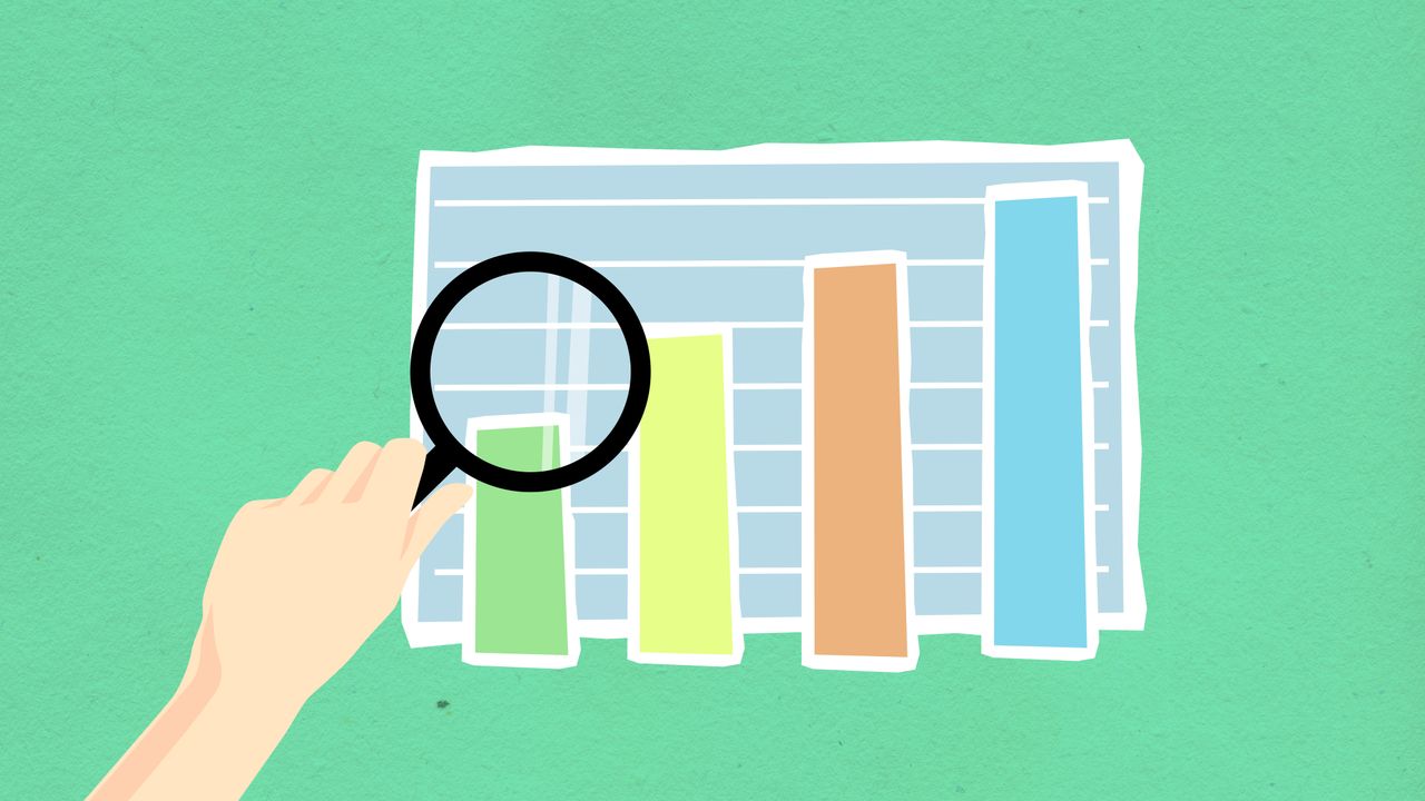 Magnifying glass examining an upward growth chart representing SEO performance and early campaign progress